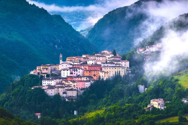 rolling countryside on sunrise near preci in the valnerina, umbria, italy